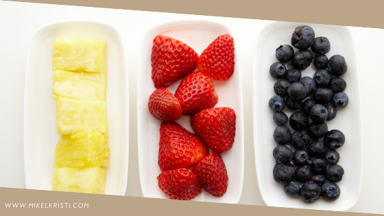 Plate of Fruits. Strawberry, Blueberries, Pineapple. 6 fruits that are good for your skin